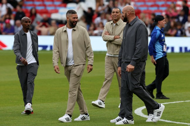 (L-R) British former athlete Mo Farah, British former boxer Tony Bellew, French former footballer David Trezeguet and British former boxer Tyson Fury walk on the pitch ahead of the England XI v World XI charity football match for Soccer Aid for Unicef at Old Trafford in Manchester, north-west England on June 15, 2025. (Photo by Darren Staples / AFP) (Photo by DARREN STAPLES/AFP via Getty Images)