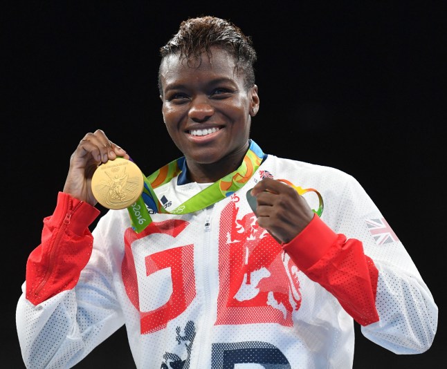 Great Britain's Nicola Adams poses on the podium with a gold medal during the Rio 2016 Olympic Games at the Riocentro - Pavilion 6 in Rio de Janeiro on August 20, 2016. / AFP / Yuri CORTEZ (Photo credit should read YURI CORTEZ/AFP via Getty Images)