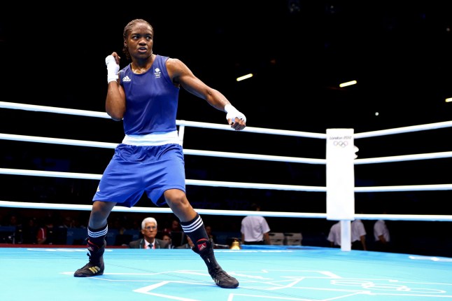 LONDON, ENGLAND - AUGUST 06: Nicola Adams (Blue) of Great Britain celebrates after defeating Stoyka Petrova of Bulgaria during the Women's Fly (51kg) Boxing Quarterfinals on Day 10 of the London 2012 Olympic Games at ExCeL on August 6, 2012 in London, England. (Photo by Scott Heavey/Getty Images)
