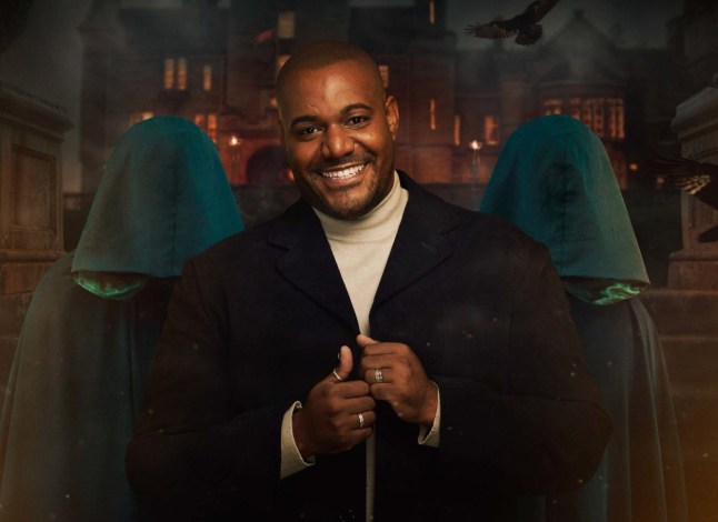 Miles from The Traitors in front of hooded figures in promotional image for BBC show