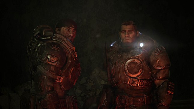Two Gears of War E-Day characters in armour turning to the camera
