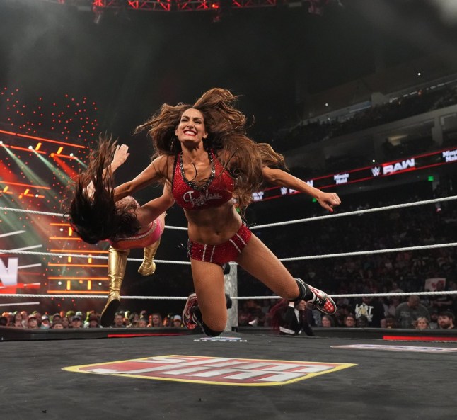 BIRMINGHAM, ALABAMA - JULY 14: Nikki Bella with a big clothesline to Chelsea Green during Monday Night RAW at Legacy Arena at the BJCC on July 14, 2025 in Birmingham, Alabama. (Photo by Michael Owens/WWE via Getty Images)