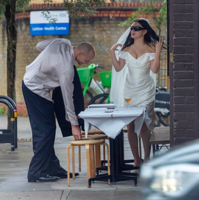20 July 2025 - EXCLUSIVE. UK ONLINE AND PAPER - ??1500 min fee Charli XCX's Surprise Wedding Bash! Pop Star Weds in Hackney Before Heading to Dalston Rave-Up Pop rebel Charli XCX stunned fans as she tied the knot in a low-key ceremony at Hackney Town Hall - before taking the celebrations to a local Italian eatery just around the corner! The chart-topping singer and her new hubby, George Daniel (of The 1975 fame), kept things chic and cheeky, strolling hand-in-hand to the restaurant they'd hired out for close pals and family. The whole do was themed Italian - a cheeky nod to their upcoming second wedding blowout set to take place in Italy later this summer. After wining and dining until around 10pm, the newlyweds snuck off to change before making a grand entrance at Ellies on Kingsland Road, Dalston at around 11pm - where the real party kicked off! Guests were spotted piling into the late-night hotspot, with the bash reportedly going on into the early hours. A source said: "It was classic Charli - stylish, fun, and totally unexpected. Everyone was in the mood to celebrate! " Credit: CLICK NEWS AND MEDIA Ref: AMdef **Exclusive to CLICK NEWS AND MEDIA** CLICK NEWS AND MEDIA - PICTURES@CLICKNEWSANDMEDIA.COM - 07774 321240 -