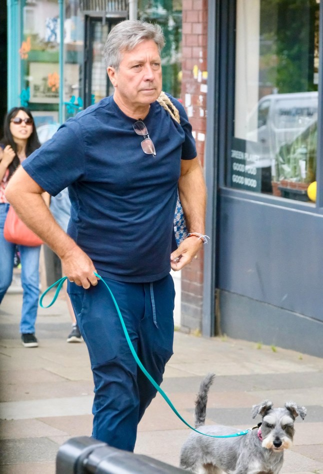 Exclusive - TV chef John Torode marked his 60th birthday with a low-key outing, seen for the first time since he was sacked from Masterchef. He was spotted walking his dog and picking up healthy ingredients at an organic food store in North London. Pic TillenDove 230725