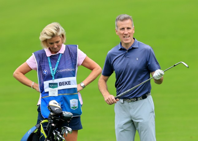 VIRGINIA WATER, ENGLAND - SEPTEMBER 13: Anton du Beke of England the BBC Strictly Come Dancing dancer and judge chooses his club before he plays a shot with his wife Hannah Summersduring the pro-am prior to the BMW PGA Championship at Wentworth Golf Club on September 13, 2023 in Virginia Water, England. (Photo by David Cannon/Getty Images)