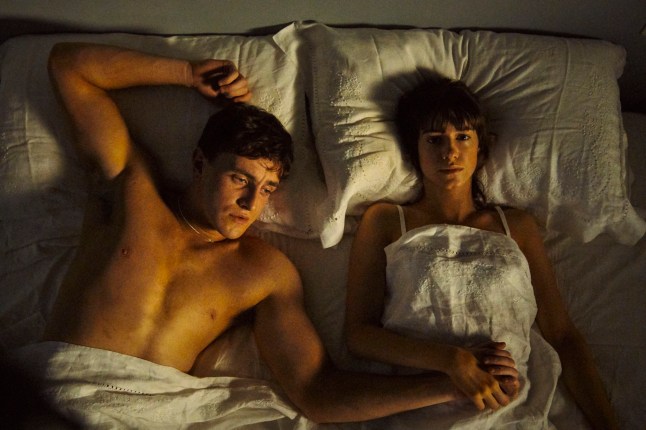 Paul Mescal as Connell and Daisy Edgar Jones as Marianne in Normal People on bed