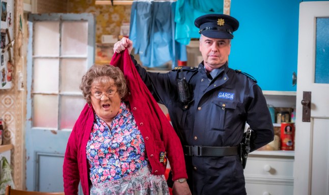 Programme Name: Mrs Brown's Boys Christmas and New Year Special 2020 - TX: 25/12/2020 - Episode: Mrs Brown's Boys Christmas and New Year Special 2020 - EP2 New Year (No. 2) - Picture Shows: Mrs Brown (BRENDAN O???CARROLL), Gunter (MARK SHERIDAN) - (C) BBC Studios - Photographer: Alan Peebles
