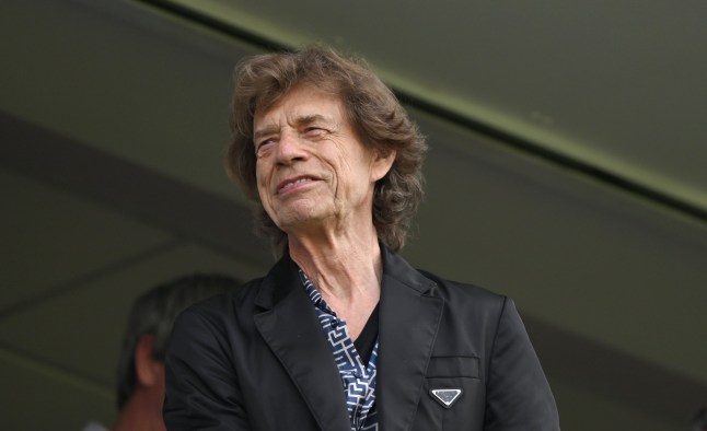LONDON, ENGLAND - JULY 28: The Rolling Stones lead singer Mick Jagger smiles as he watches the cricket during day two of the LV= Insurance Ashes 5th Test Match between England and Australia at The Kia Oval on July 28, 2023 in London, England. (Photo by Stu Forster/Getty Images) 14022291