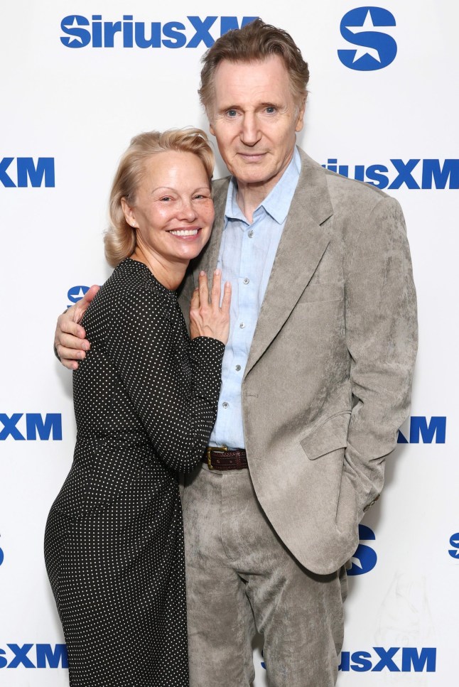 NEW YORK, NEW YORK - JULY 30: Pamela Anderson and Liam Neeson attend SiriusXM's Town Hall with the cast of "The Naked Gun" hosted by Andy Cohen at SiriusXM Studios on July 30, 2025 in New York City. (Photo by Cindy Ord/Getty Images for SiriusXM)