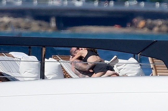 PREMIUM EXCLUSIVE: Victoria and David Beckham seen enjoying the sun during their vacation aboard their luxury yacht Seven in Saint Tropez. 29 Jul 2025 Pictured: David and Victoria Beckham. Photo credit: Spread Pictures/MEGA TheMegaAgency.com sales@mega.global