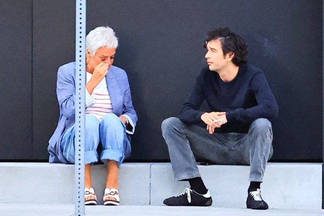 BGUK_3312137 - *PREMIUM-EXCLUSIVE* Los Angeles, CA MUST CALL FOR PRICING BEFORE USAGE - STRICTLY NOT AVAILABLE FOR ONLINE USAGE UNTIL 18:50 PM UK TIME ON 02/08/2025 - Matty Healy and his girlfriend, Gabriella Bechtel, were seen leaving a romantic dinner at Stella restaurant. Matty took some time to smoke a cigarette outside with his mother, sitting on the sidewalk, and his mother started crying. Recently, his mother said that she didn't want to be the mother-in-law of his ex-girlfriend, Taylor Swift Pictured: Matty Healy, Denise Welch BACKGRID UK 1 AUGUST 2025 BYLINE MUST READ: The Hollywood JR / BACKGRID UK: +44 208 344 2007 / uksales@backgrid.com USA: +1 310 798 9111 / usasales@backgrid.com *Pictures Containing Children Please Pixelate Face Prior To Publication*