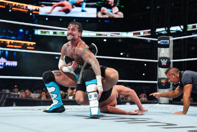 EAST RUTHERFORD, NEW JERSEY - AUGUST 2: CM Punk in action against Gunther during SummerSlam at MetLife Stadium on August 2, 2025 in East Rutherford, New Jersey. (Photo by Georgiana Dallas/WWE via Getty Images)