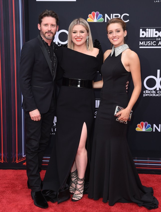 LAS VEGAS, NV - MAY 20: Host Kelly Clarkson (C), Brandon Blackstock and Savannah Blackstock attend the 2018 Billboard Music Awards at MGM Grand Garden Arena on May 20, 2018 in Las Vegas, Nevada. (Photo by Axelle/Bauer-Griffin/FilmMagic)