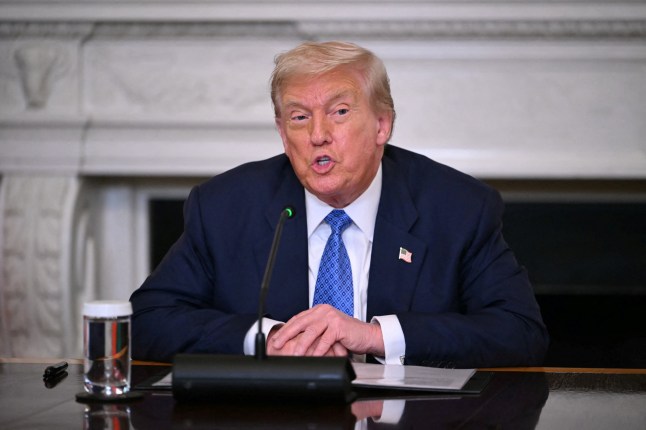 US President Donald Trump participates in a trilateral signing with Azerbaijani President Ilham Aliyev and Armenian Prime Minister Nikol Pashinyan in the State Dining Room of the White House in Washington, DC, on August 8, 2025. US President Donald Trump is hosting the leaders of Armenia and Azerbaijan on Friday, with the two South Caucasus rivals expected to sign a deal advancing peace efforts after decades of conflict. Armenian Prime Minister Nikol Pashinyan and Azerbaijan's longtime President Ilham Aliyev will attend a "Historic Peace Summit" at the White House, Trump announced on his Truth Social platform. He did not elaborate on the deal's details, but it would join a growing list of US-brokered initiatives for which the president believes he should win a Nobel Peace Prize. (Photo by ANDREW CABALLERO-REYNOLDS / AFP) (Photo by ANDREW CABALLERO-REYNOLDS/AFP via Getty Images)