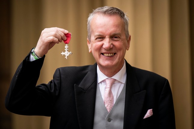 LONDON, ENGLAND - APRIL 20: Christopher Collins professionally known as Frank Skinner poses after being made a member of the Order of the British Empire (MBE) for services to entertainment during an investiture ceremony at Buckingham Palace on April 20, 2023 in London, England. Photo by Aaron Chown - WPA Pool/Getty Images)